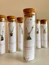 Load image into Gallery viewer, Pulseras navideñas en tubitos de cristal
